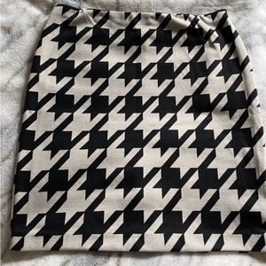 Lot of 3 Worthington patterned skirts. All size M.